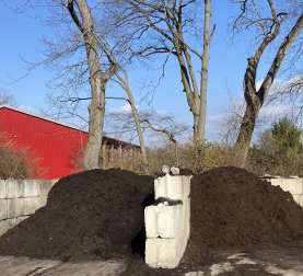 Three piles of mulch